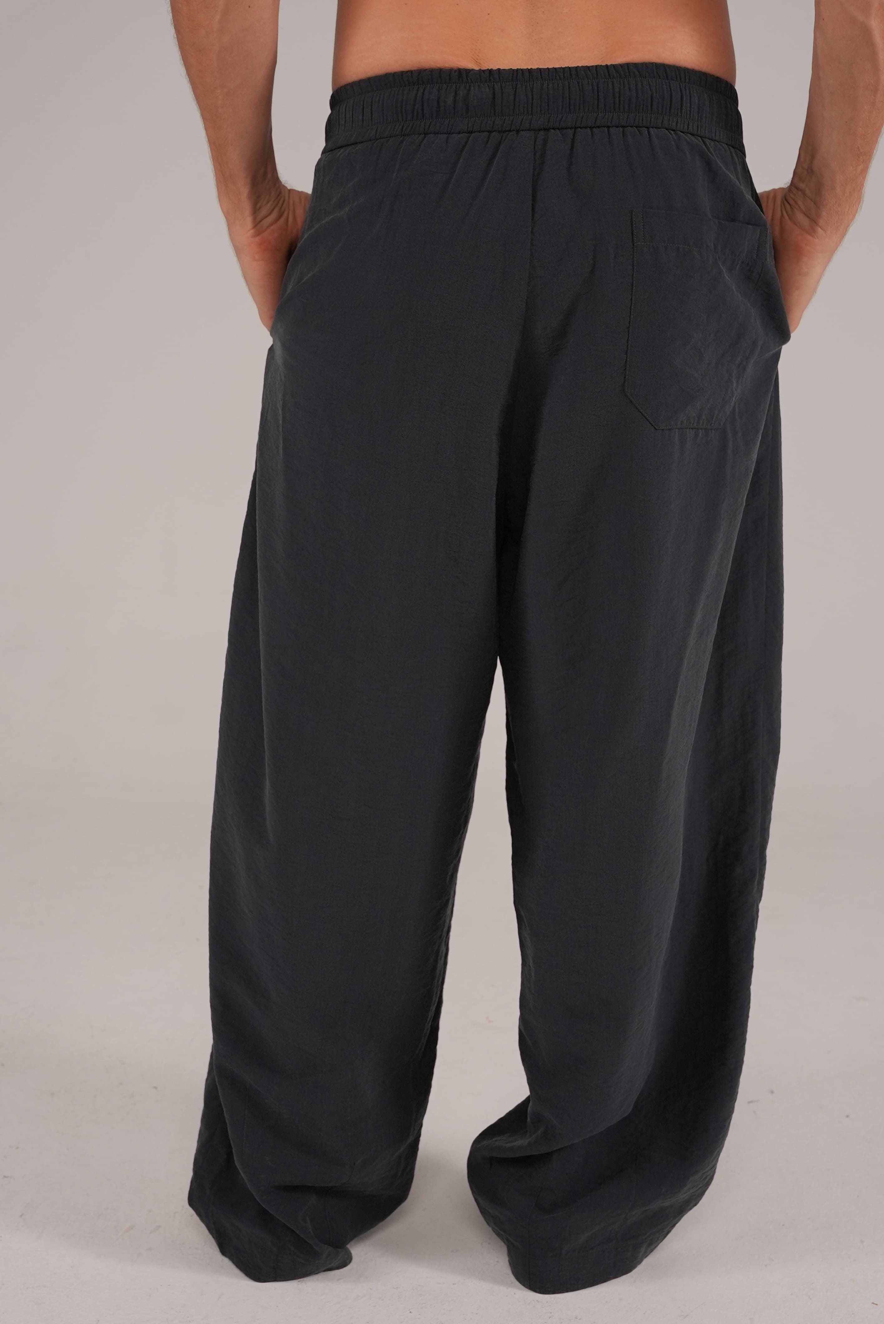 Fluid Cupro Trousers in Black