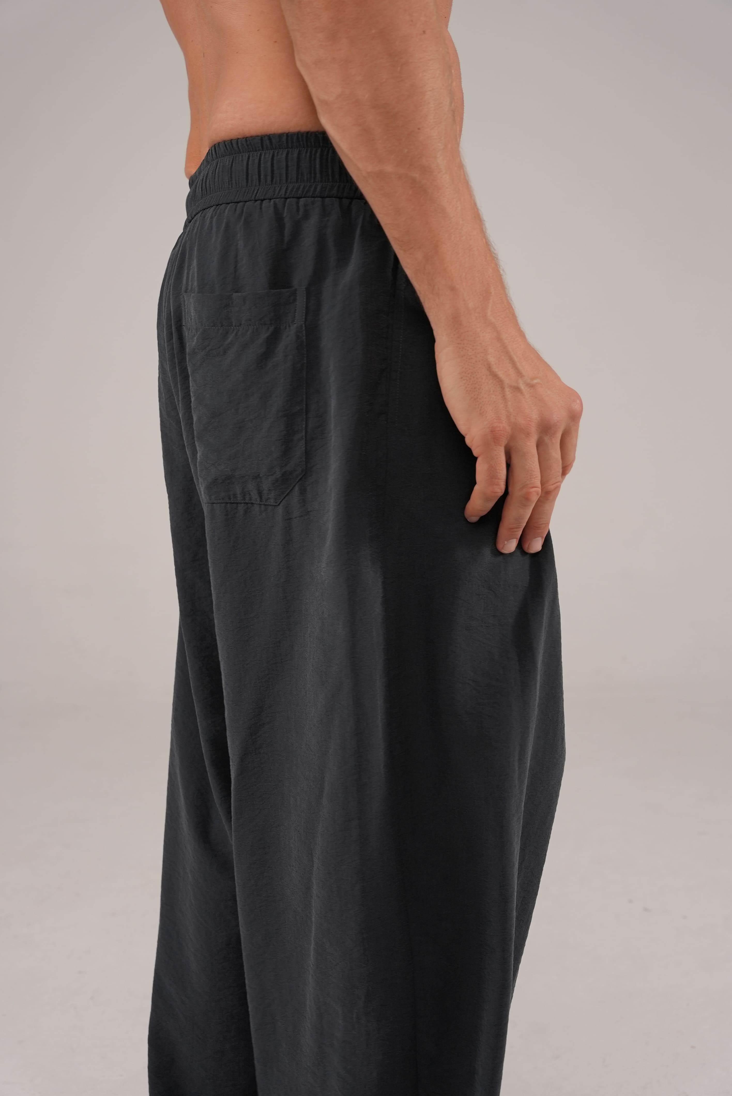 Fluid Cupro Trousers in Black